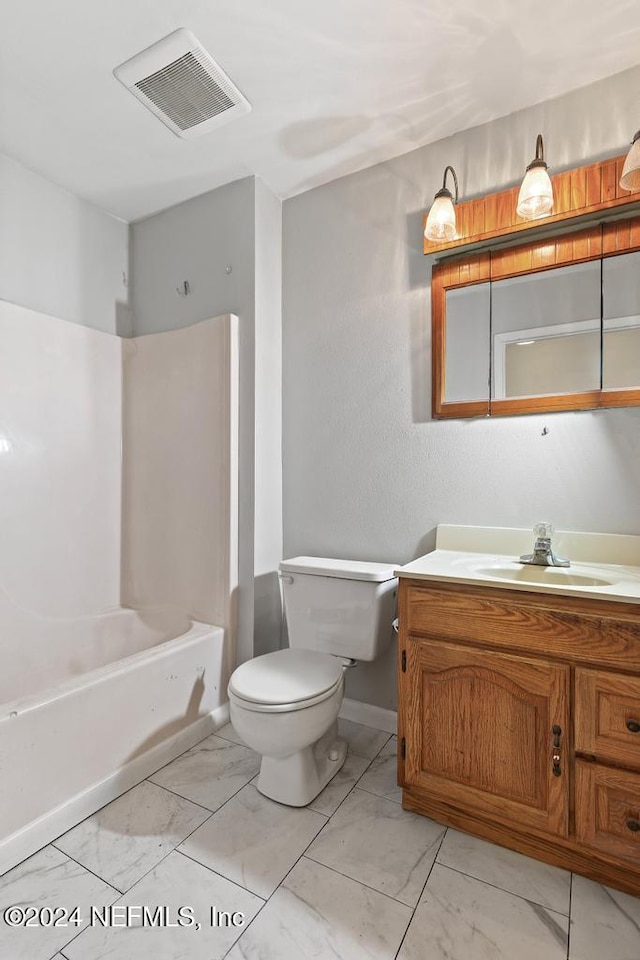 full bathroom featuring vanity, toilet, and bathing tub / shower combination