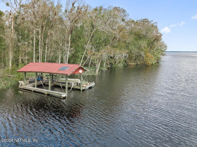 view of dock with a water view