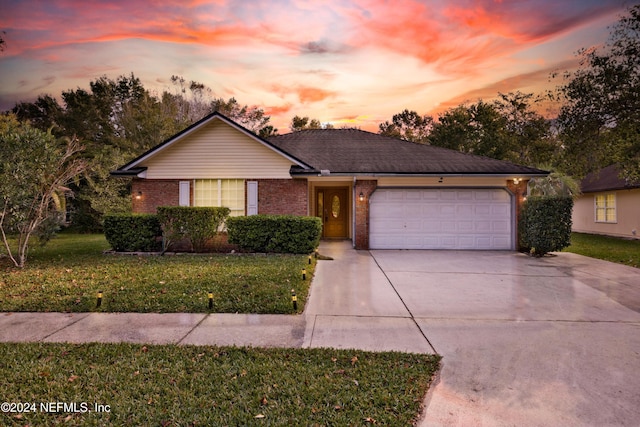 2007 Hovington Cir E, Jacksonville, FL 32246 - ranch-style house with a yard and a garage