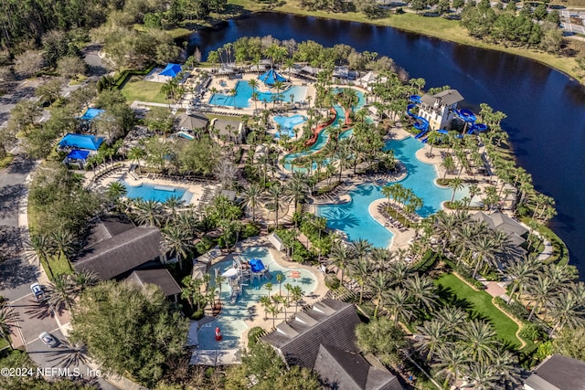 birds eye view of property featuring a water view