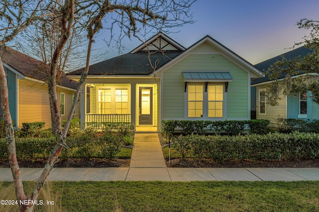 bungalow featuring a porch