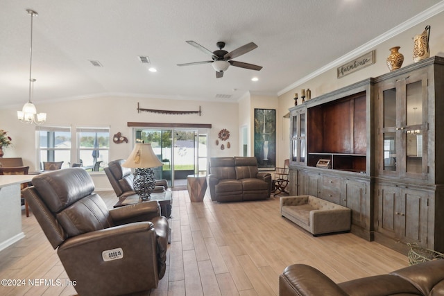 living room featuring vaulted ceiling, light hardwood / wood-style floors, ceiling fan with notable chandelier, and ornamental molding