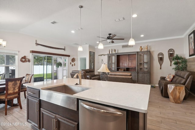 kitchen with a center island with sink, dishwasher, ceiling fan, and decorative light fixtures