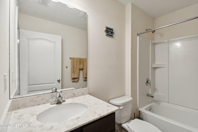 full bathroom with shower / washtub combination, vanity, and toilet