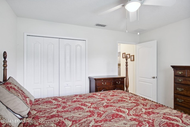 bedroom featuring ceiling fan and a closet