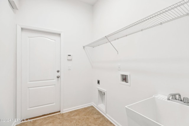 laundry room featuring electric dryer hookup, sink, and washer hookup