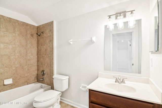 full bathroom featuring vanity, vaulted ceiling, toilet, and tiled shower / bath combo