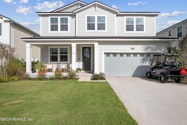 front facade with a porch, a garage, and a front lawn