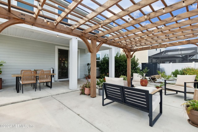 view of patio / terrace featuring a pergola and an outdoor hangout area