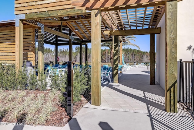 view of patio featuring a pergola