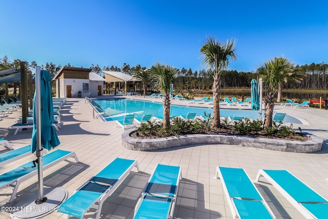 view of pool featuring a patio area