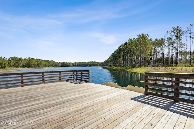 dock area with a deck with water view