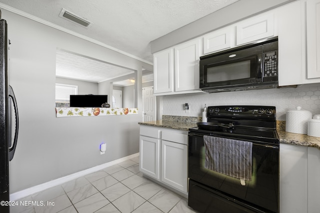 kitchen featuring white cabinets, a textured ceiling, black appliances, and dark stone counters