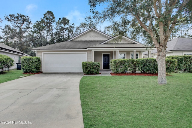 view of front facade featuring a garage and a front lawn