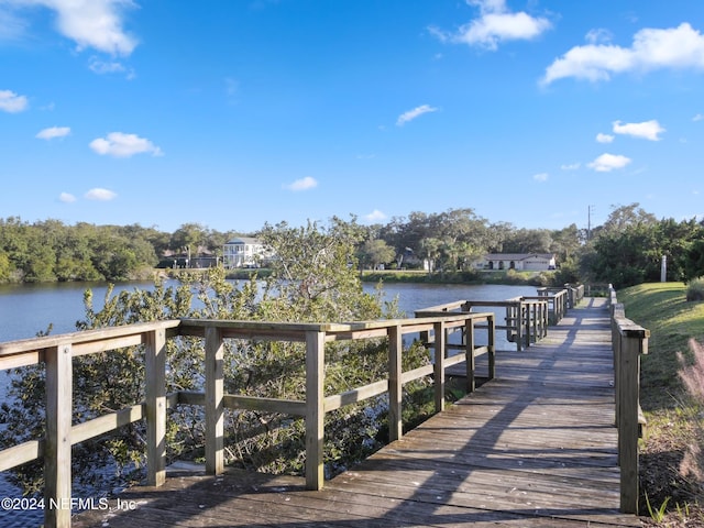 view of dock with a water view