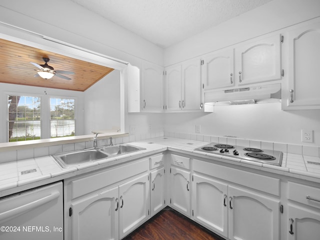 kitchen with white cabinets, white appliances, ceiling fan, and sink