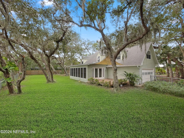 view of yard featuring a garage