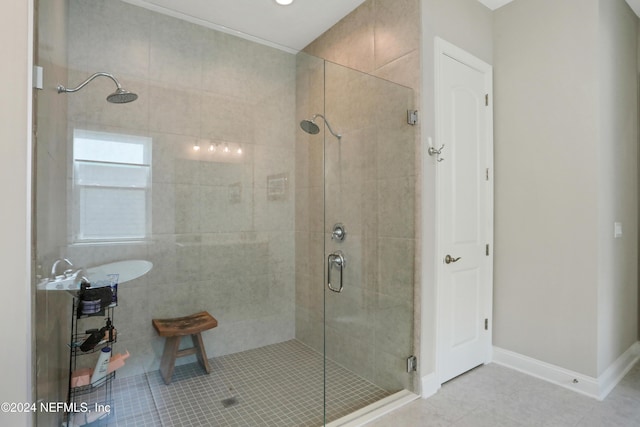 520 Back Creek Dr, Saint Augustine, FL 32092 - bathroom featuring tile patterned flooring, a shower stall, and baseboards