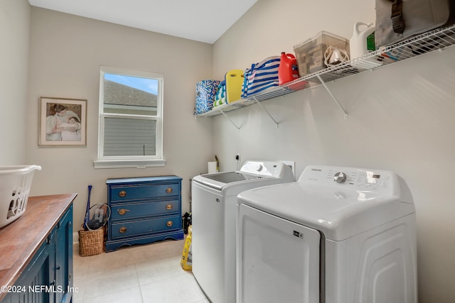 clothes washing area featuring independent washer and dryer