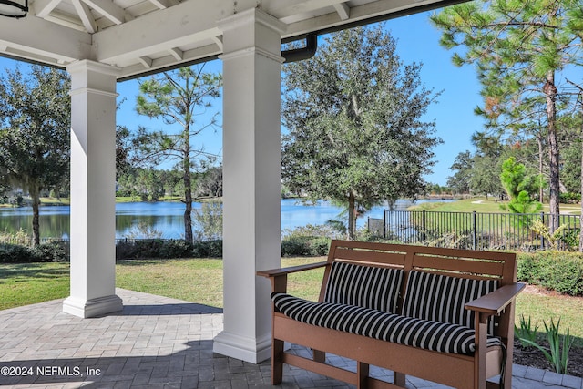 view of patio / terrace with a water view