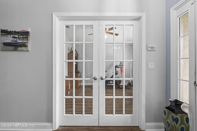 doorway to outside featuring french doors and wood-type flooring