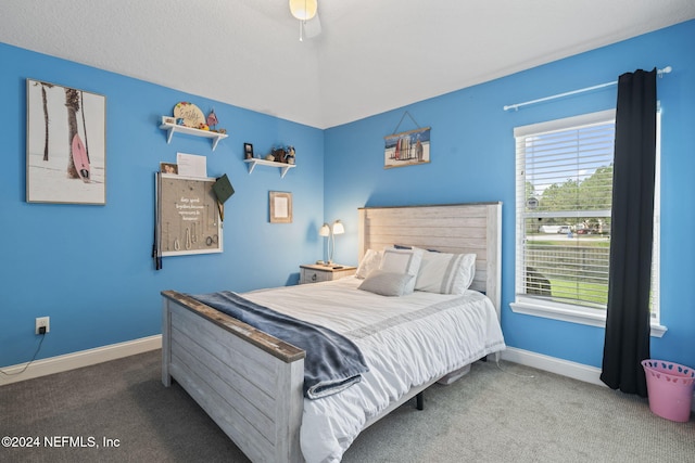 bedroom featuring ceiling fan and carpet floors