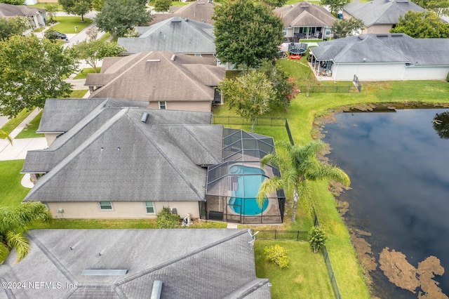 drone / aerial view with a water view