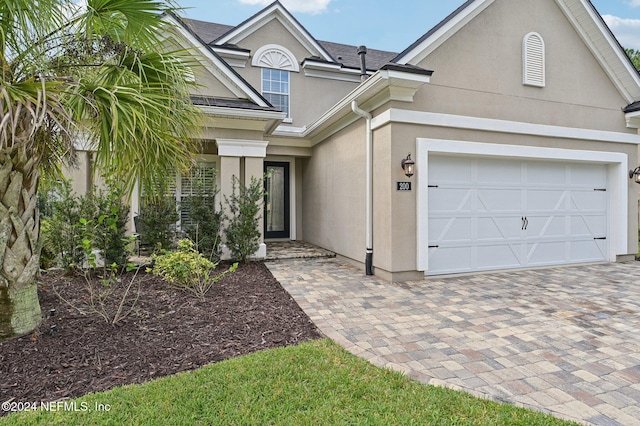 view of front of home featuring a garage