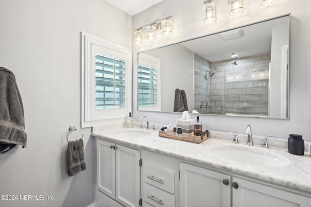 bathroom with vanity and walk in shower