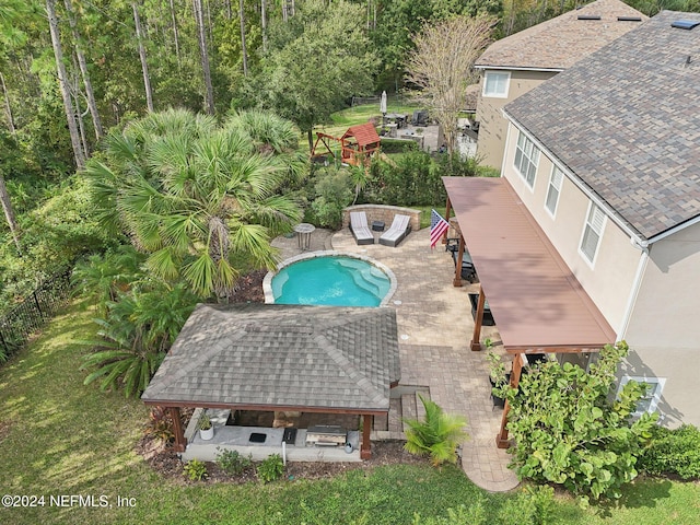 view of pool featuring a gazebo and a patio