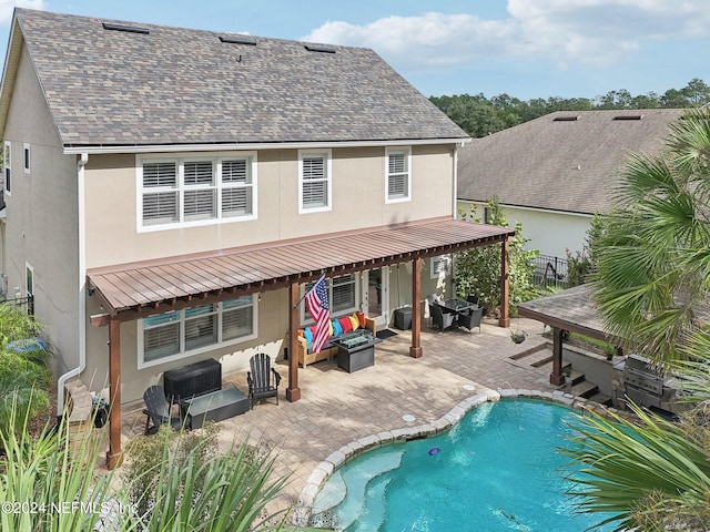 rear view of property with a patio area