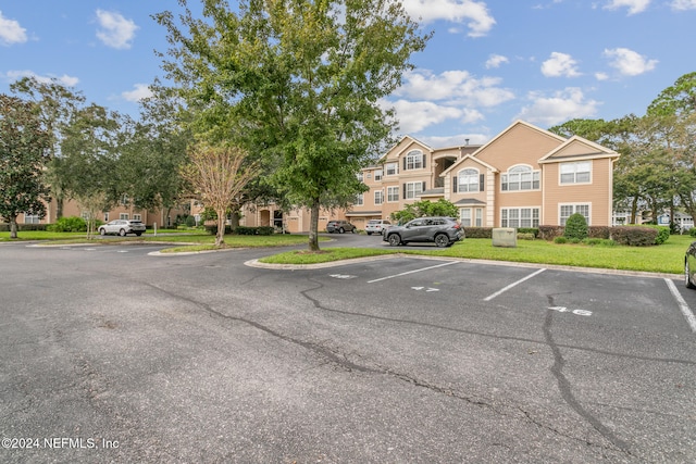 view of parking / parking lot