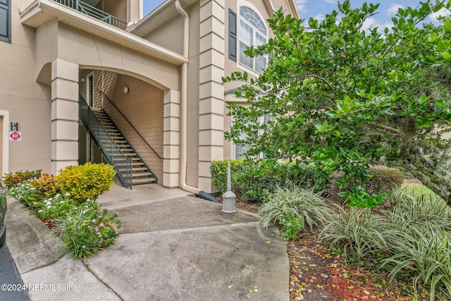 doorway to property with a balcony