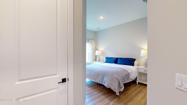 bedroom featuring light wood finished floors