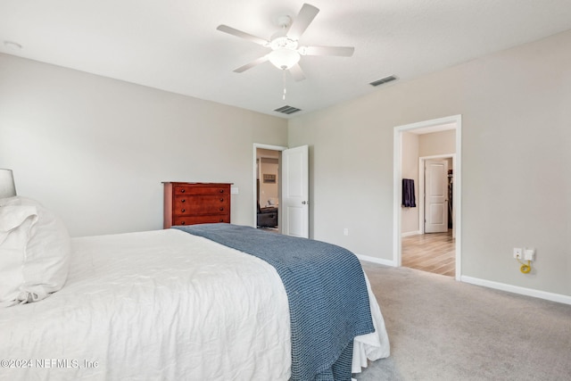 carpeted bedroom with ceiling fan