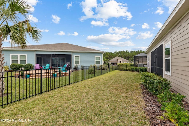 view of yard featuring a sunroom