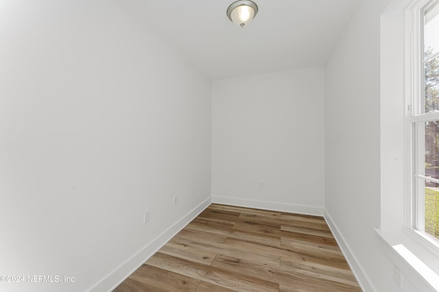 spare room featuring light wood-type flooring