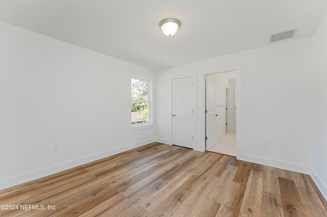 unfurnished bedroom with light hardwood / wood-style floors