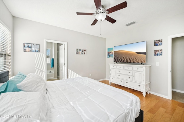 bedroom with ceiling fan and light hardwood / wood-style flooring