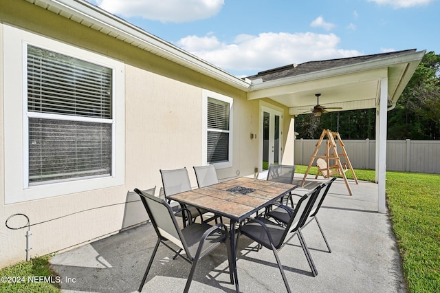 view of patio featuring ceiling fan