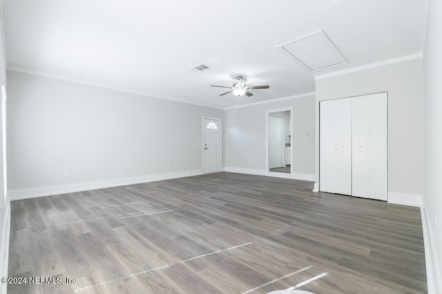 unfurnished room featuring hardwood / wood-style flooring, ceiling fan, and ornamental molding