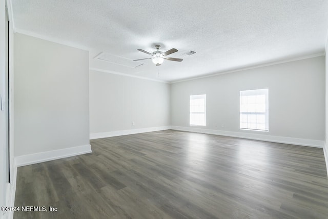 unfurnished room with a textured ceiling, dark hardwood / wood-style floors, ceiling fan, and crown molding