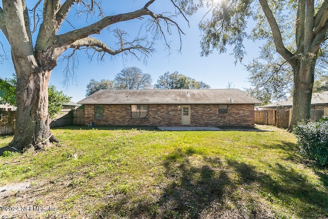 exterior space featuring a lawn