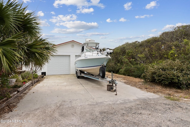 view of side of property featuring a garage