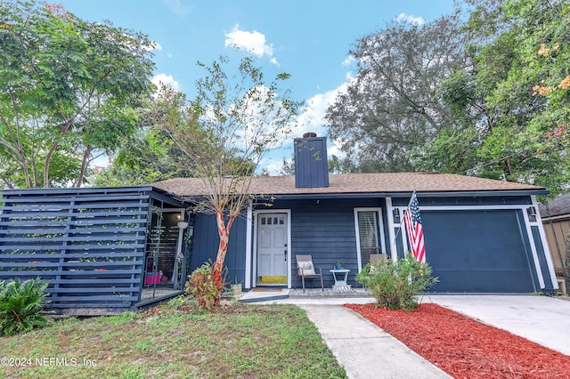 view of front of property featuring a garage