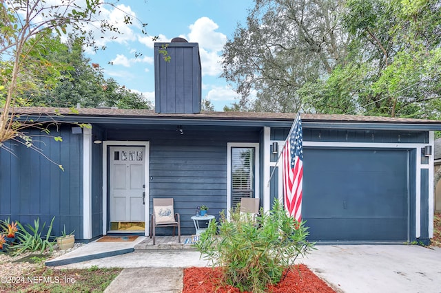 single story home with a garage