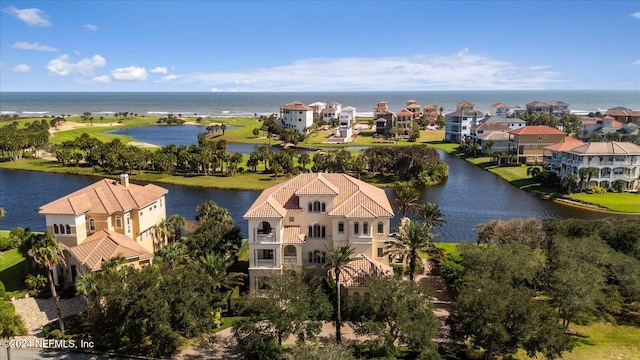 drone / aerial view featuring a water view