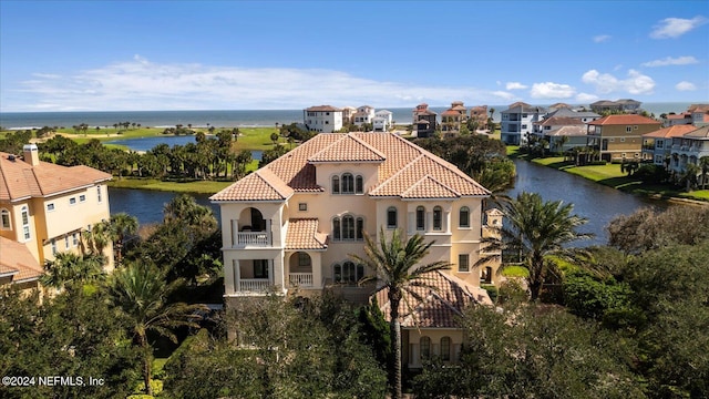 bird's eye view with a water view