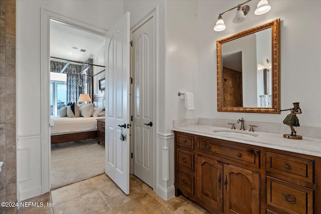 bathroom featuring vanity and tile patterned flooring