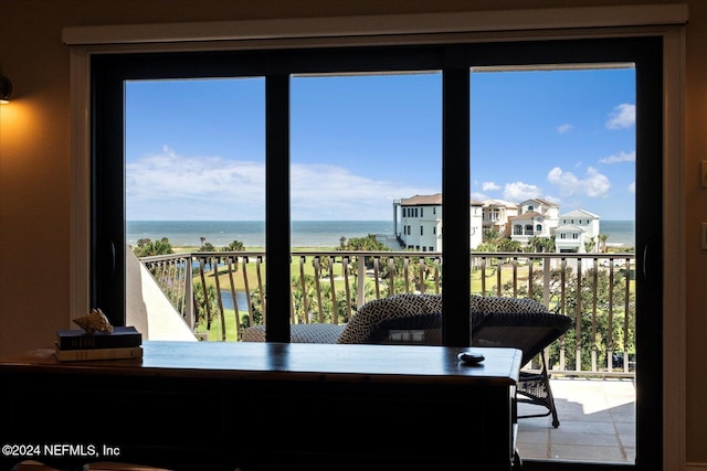 dining room featuring a water view